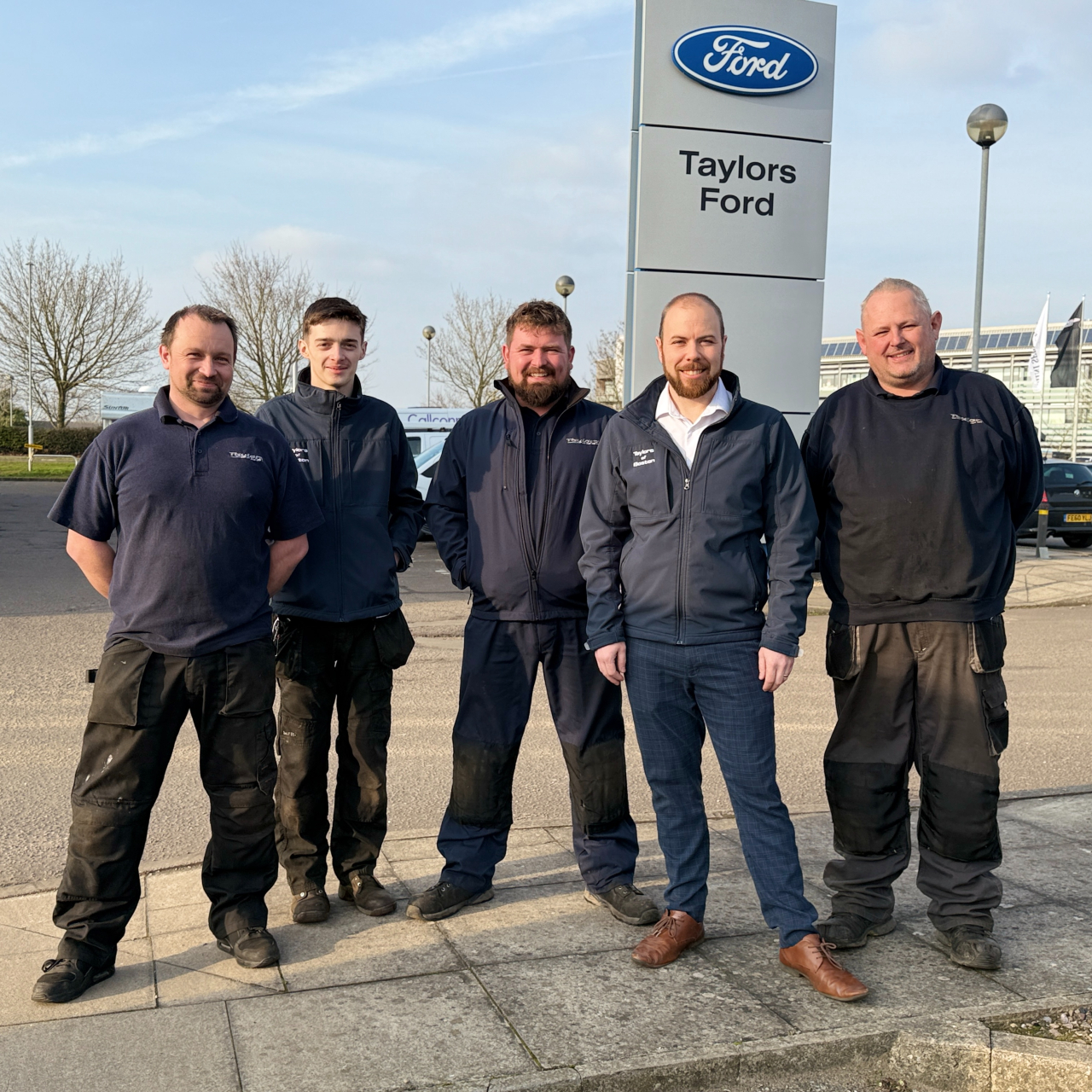 ford servicing team accept presidents award