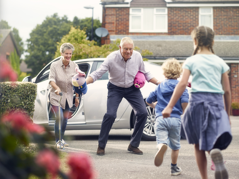 family playing with grandparents