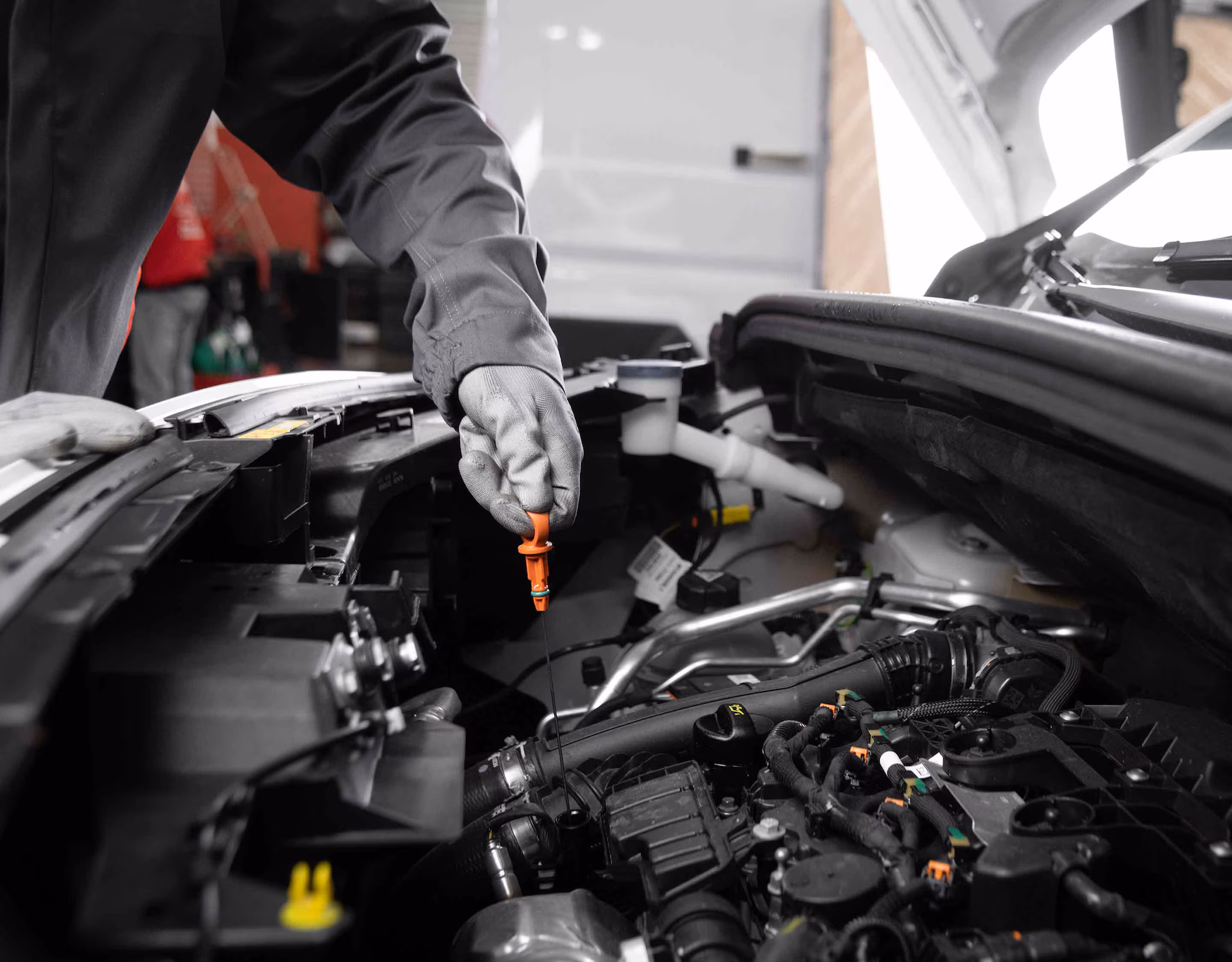 citroen technician checking oil